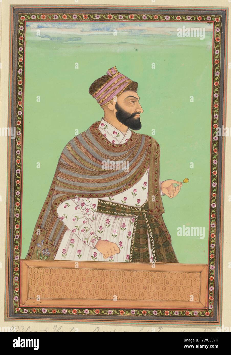 Portrait of Muhammad Ibrahim; First he served as army commander of Karnatak; He then became commander of the cavalry and now he wages war with Aurangzeb, c. 1686 drawing. Indian miniature Muhammad Ibrahim is depicted up to his hips, used to the right, a flower in his left hand. Page 29 in the `Witsen-Album ', with 49 Indian miniatures of princes. Above the portrait a piece of paper with the name in Persian. Under the portrait a piece of paper with the name in the Portuguese. Golkonda paper. deck paint. gold leaf. gouache (paint) brush ruler, sovereign. historical person (...) - historical pers Stock Photo